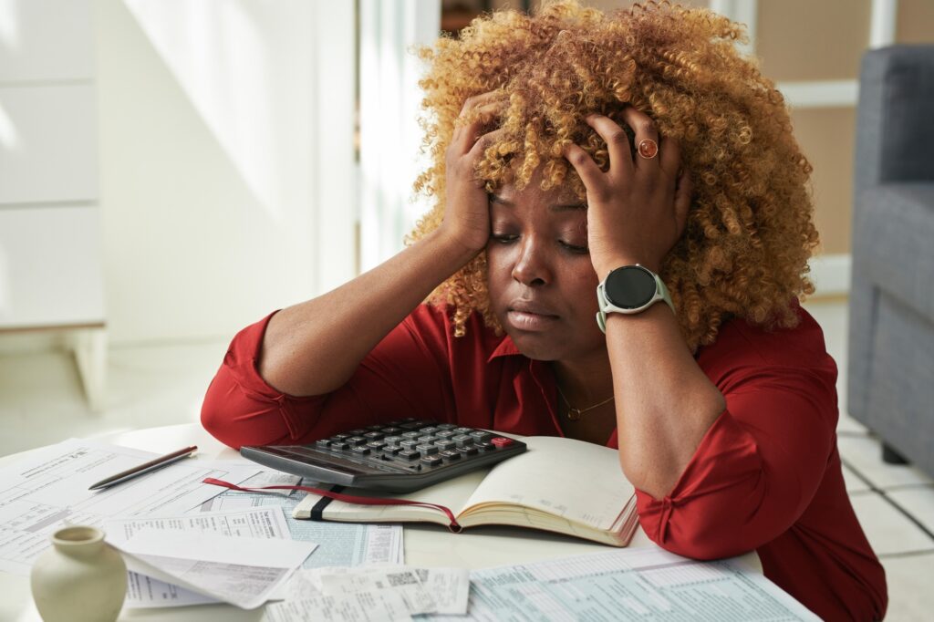 Woman tired of her bills and debts